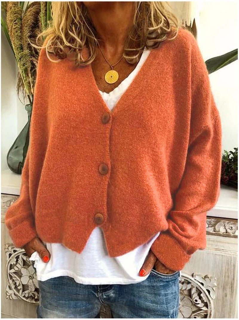 Damski sweter z dekoltem w serek