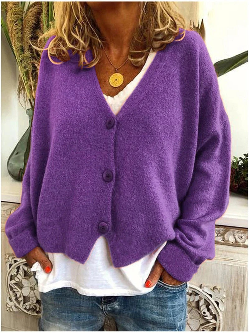 Damski sweter z dekoltem w serek
