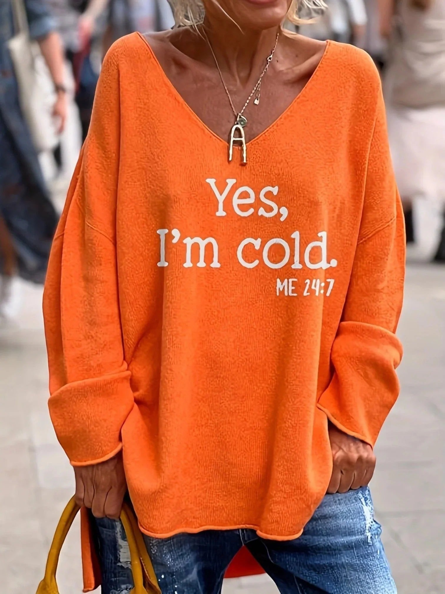 Damski sweter z dekoltem w serek oversize