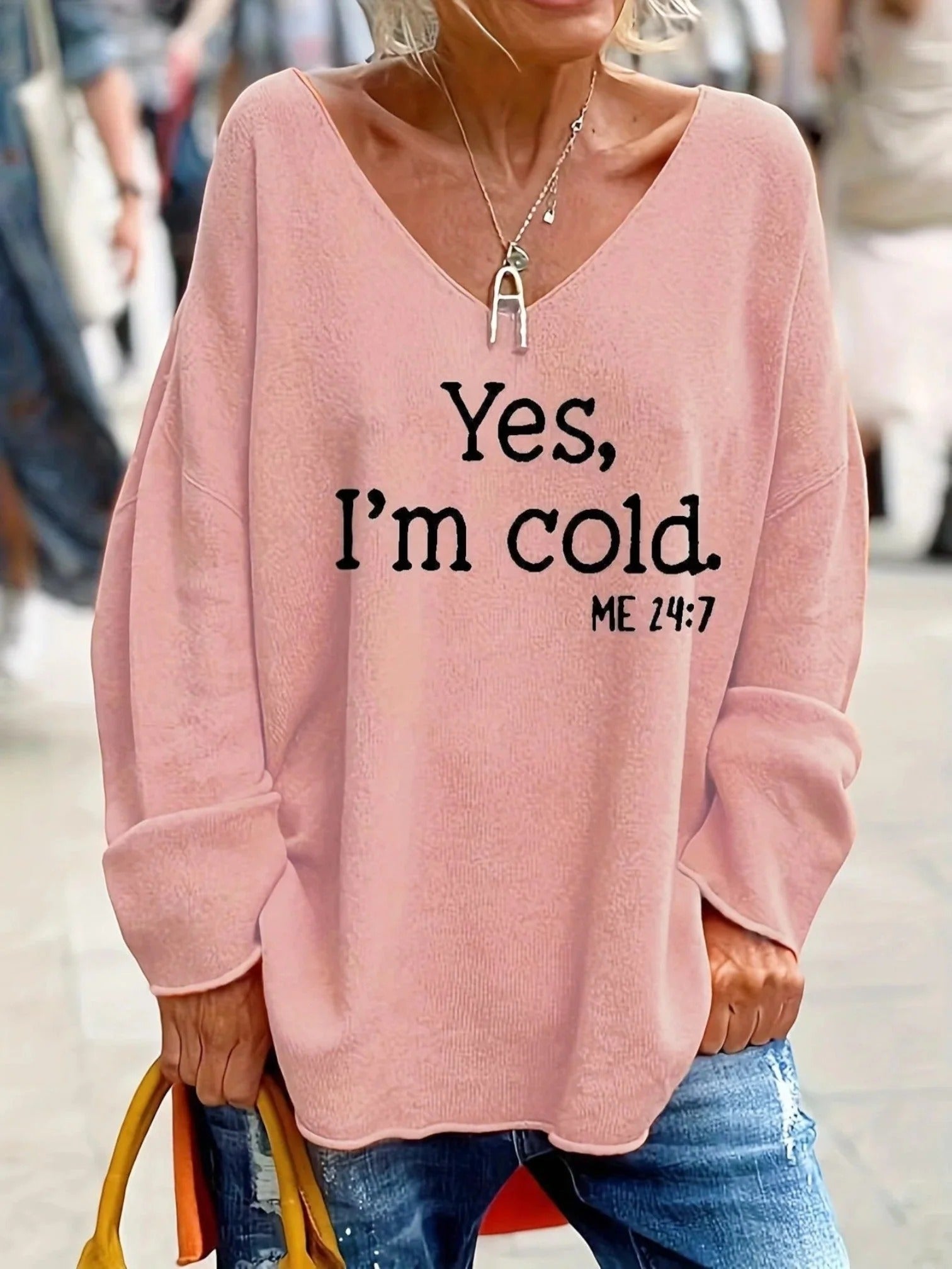 Damski sweter z dekoltem w serek oversize