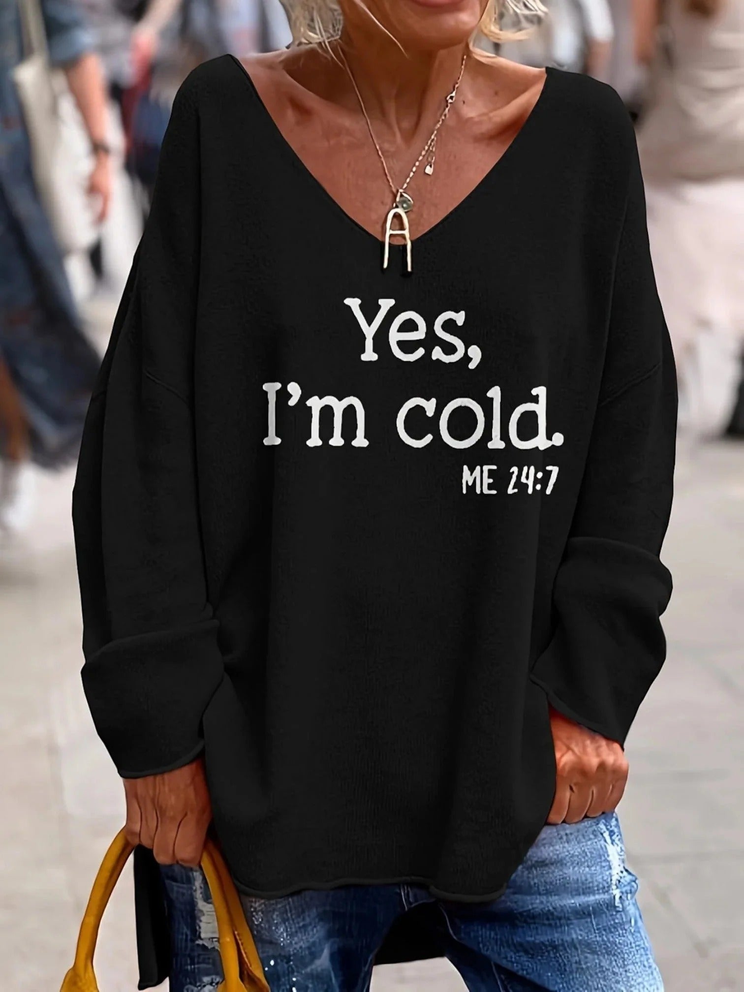 Damski sweter z dekoltem w serek oversize