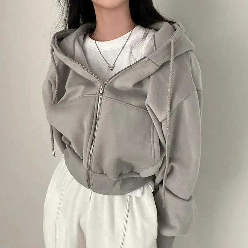 Damska krótka bluza oversize z kapturem i zamkiem