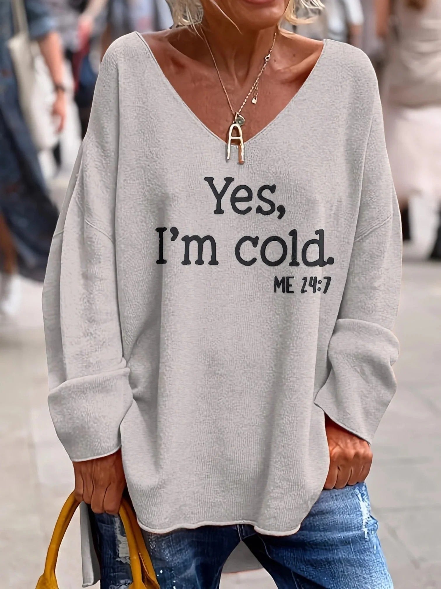 Damski sweter z dekoltem w serek oversize